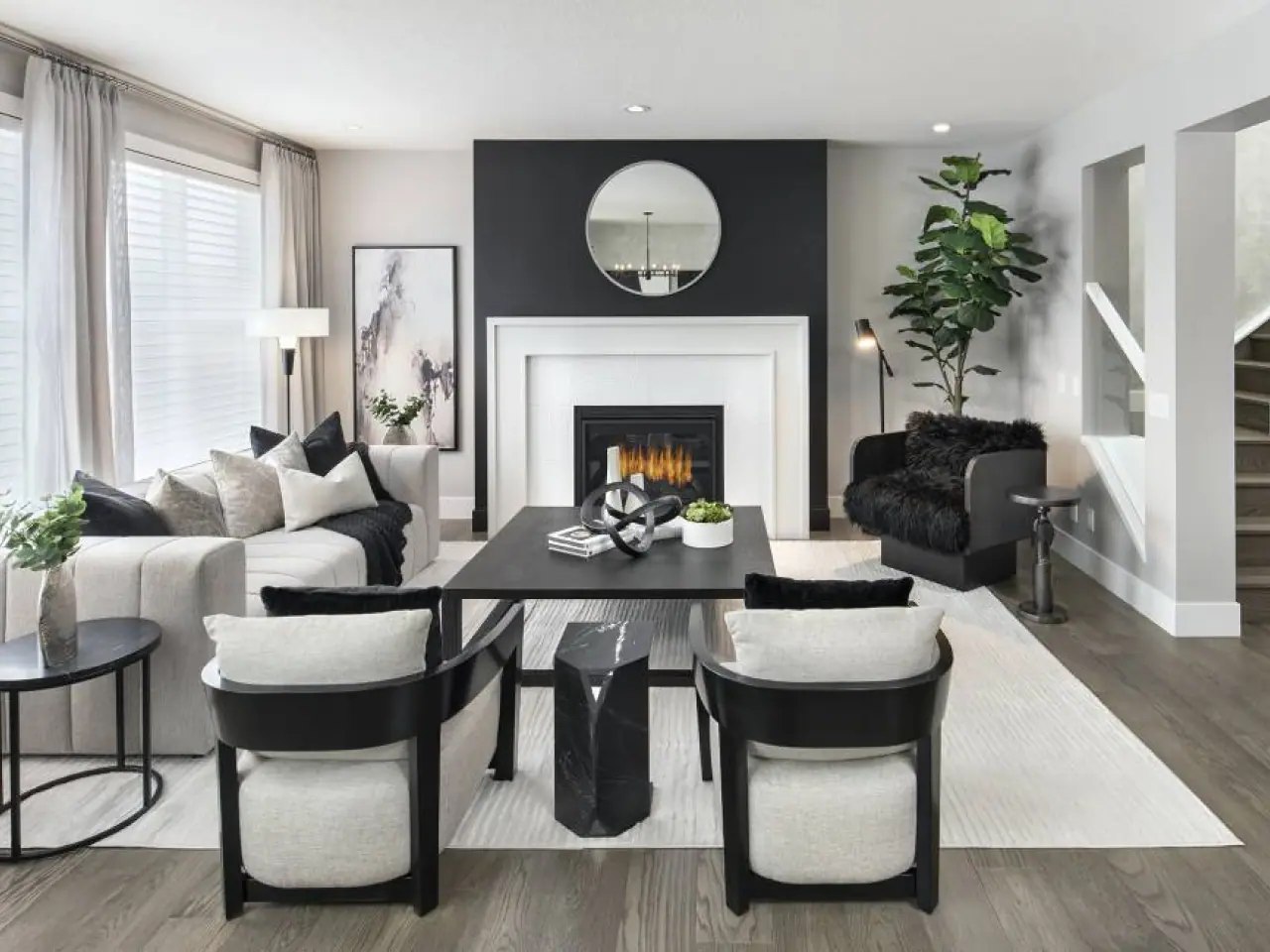 A contemporary and stylish modern living room with chic furniture, ambient lighting, and a cozy atmosphere, creating an inviting and comfortable space for relaxation and socializing.