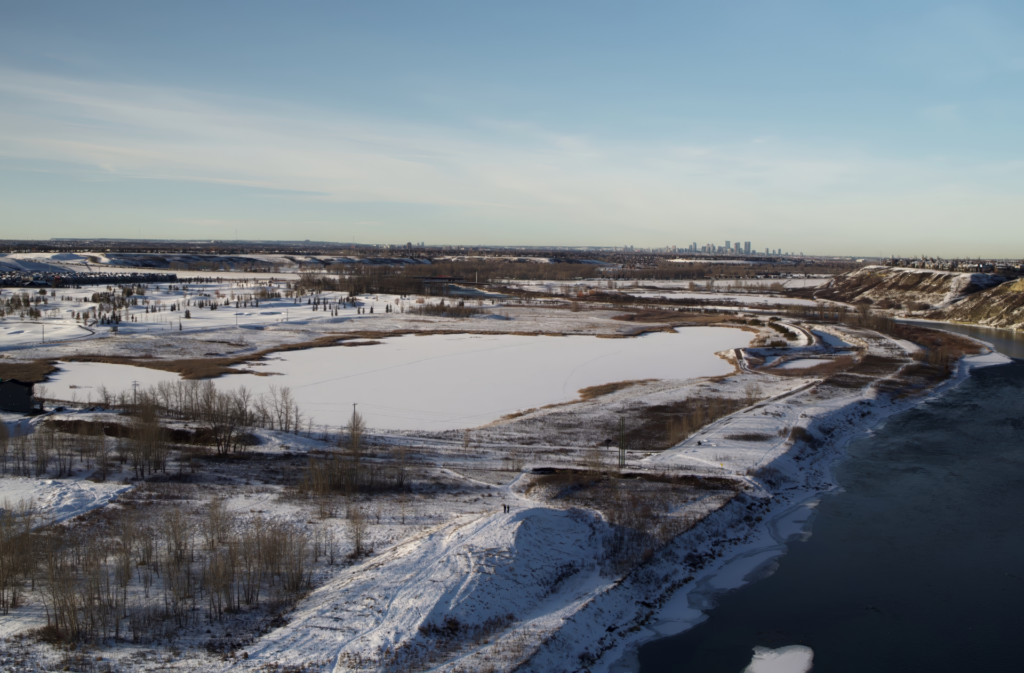 Winter views of Fish Creek Park and Wolf Willow with downtown Calgary in the distance 
