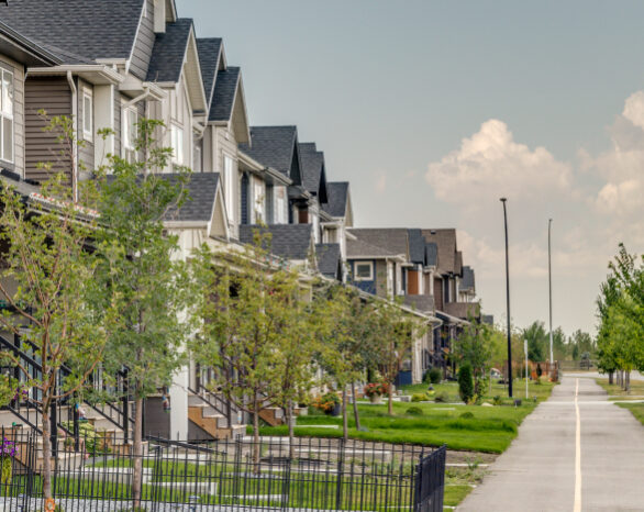 A row of townhomes next to a bike path in Wolf Willow.