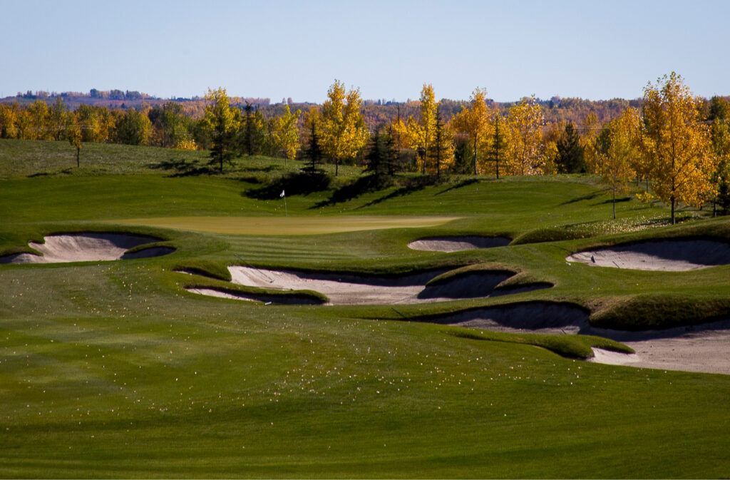 A rolling fairway and sand traps at Blue Devil Golf Course.