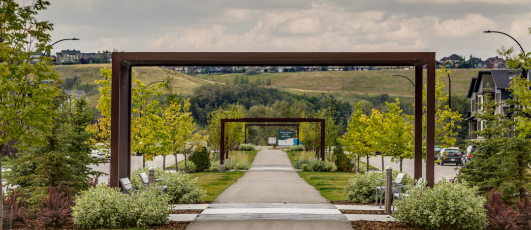 The arch filled walkway in Promenade Park in Wolf Willow.