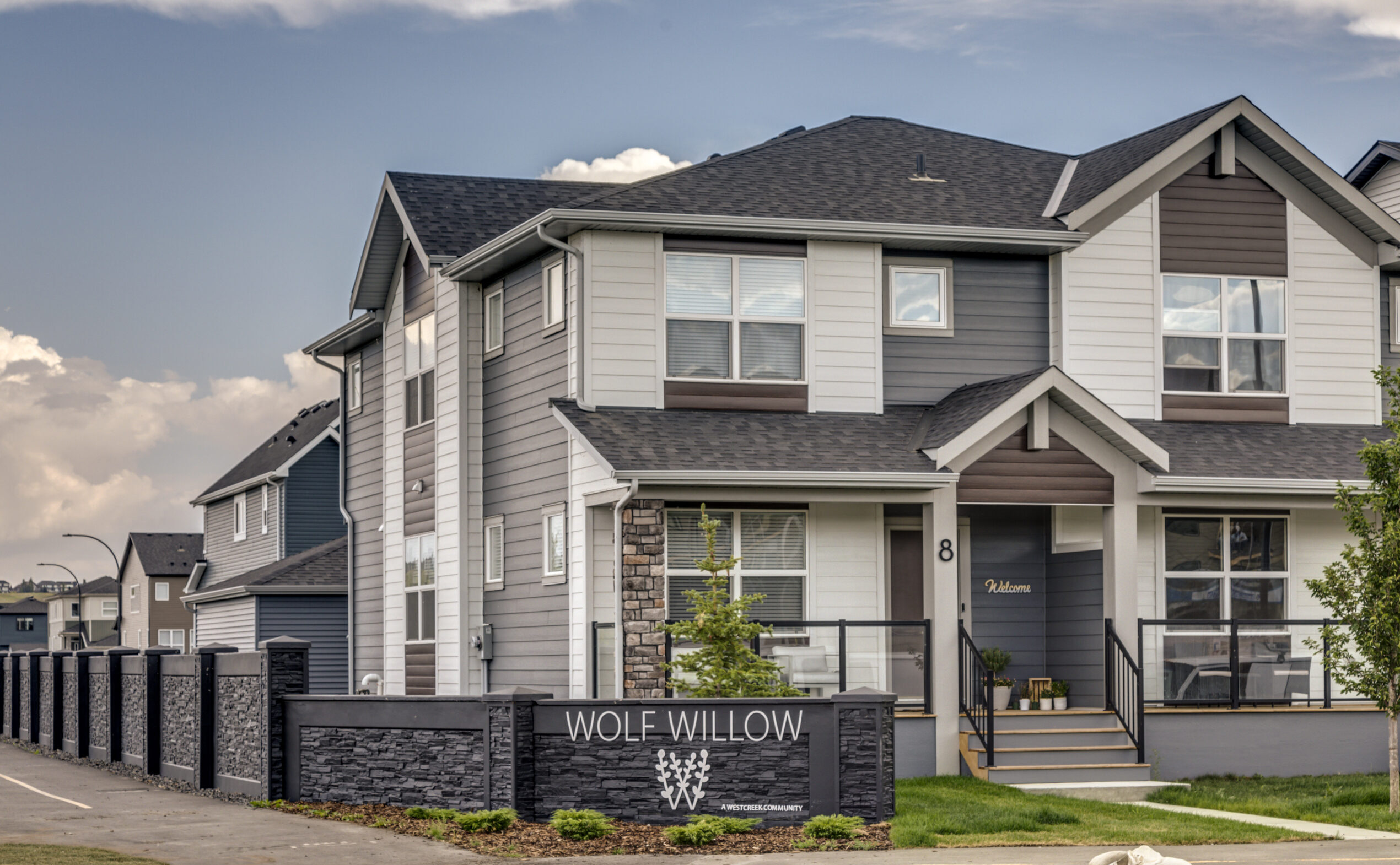 Wolf Willow Community Entrance Sign and Home