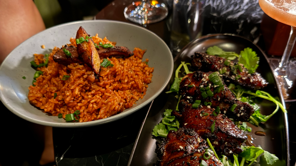 Well seasoned rice and meat dishes in a restaurant, showcasing African cuisine in South Calgary