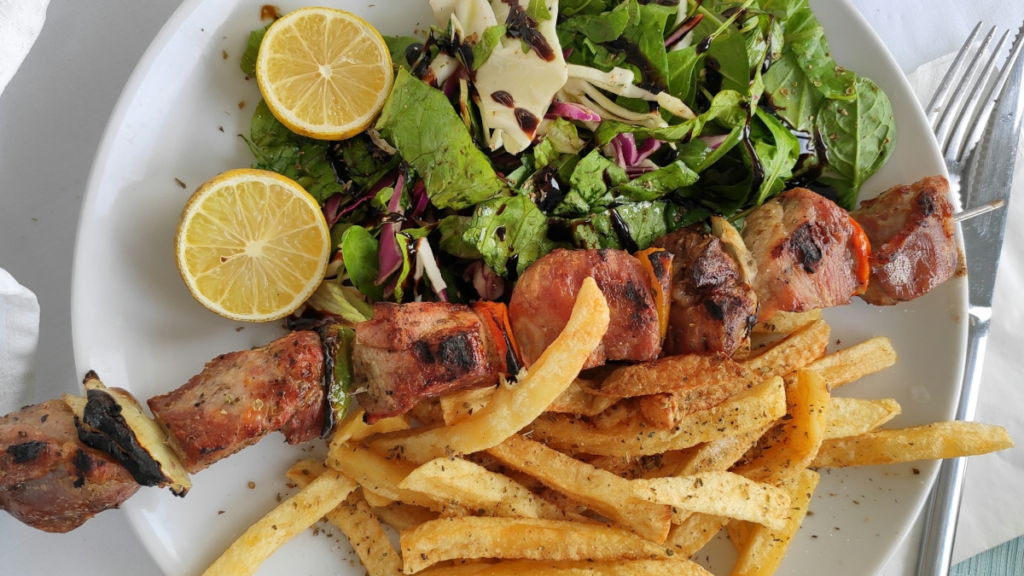 Fresh Greek souvalki with crispy fries you can order from Original Greek, a casual Greek restaurant in Midnapore, South Calgary