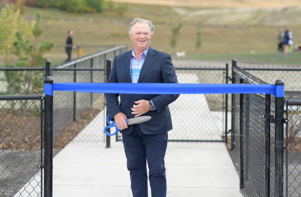 WestCreek Developments CEO Bravin Goldade opens the Woof Willow Dog Park in the SE Calgary community of Wolf Willow